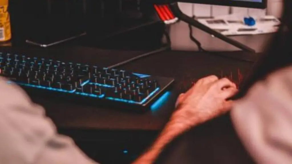 man using mouse and keyboard
