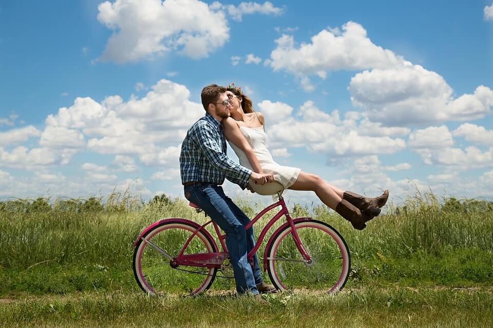 girl on boy's bike