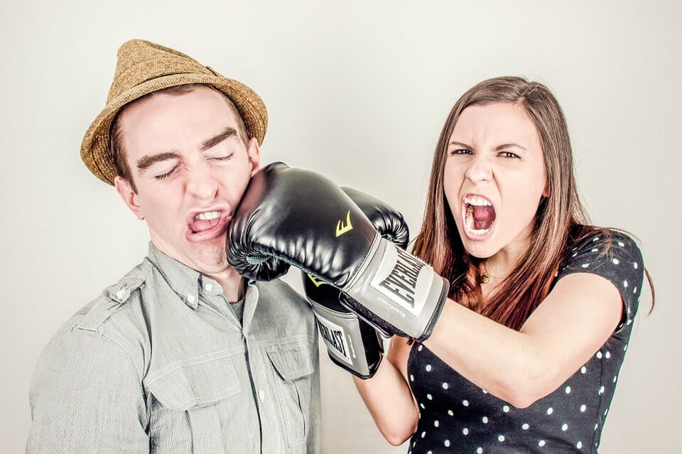 girl punches guy