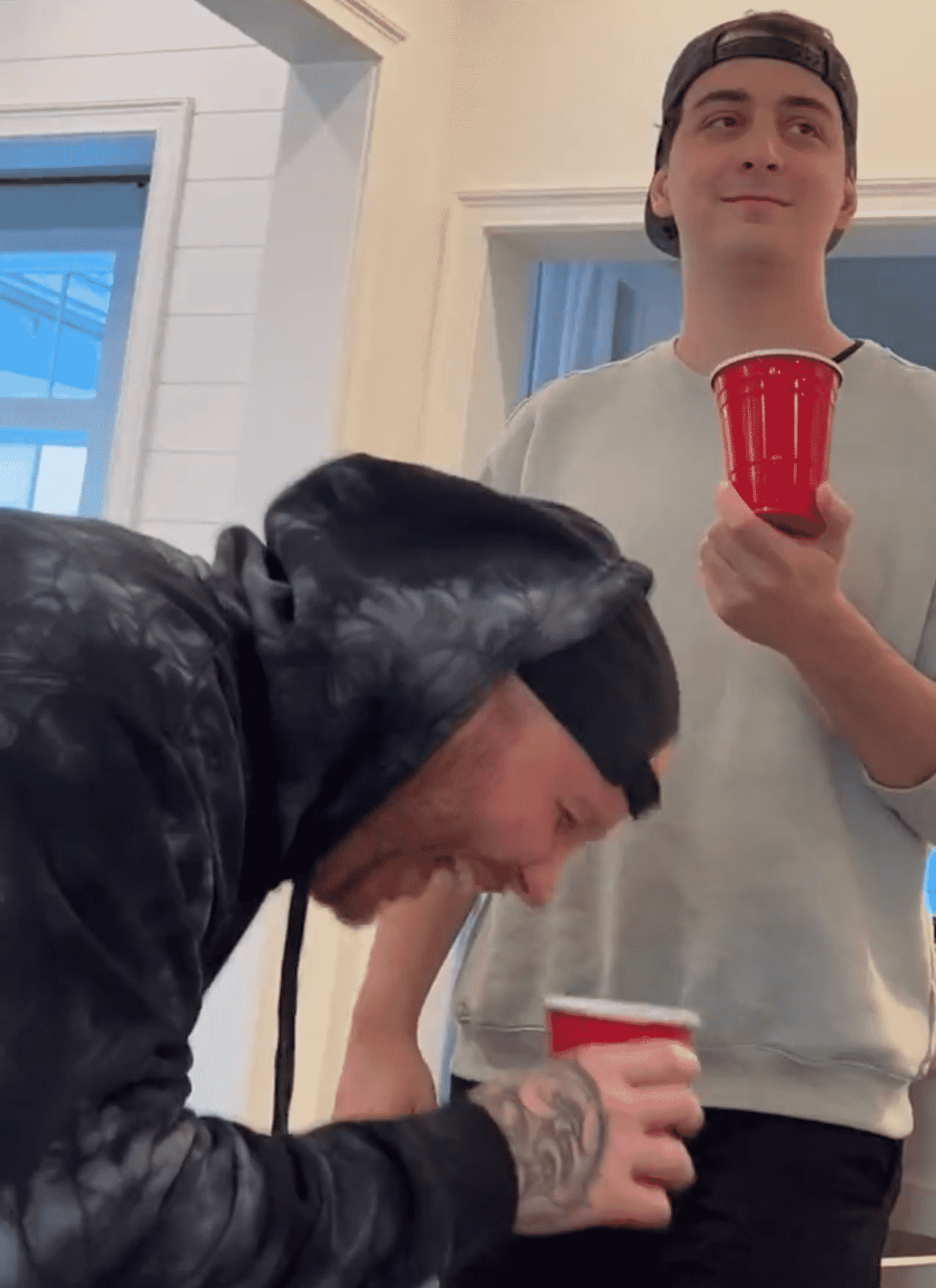 Cloakzy with a red cup