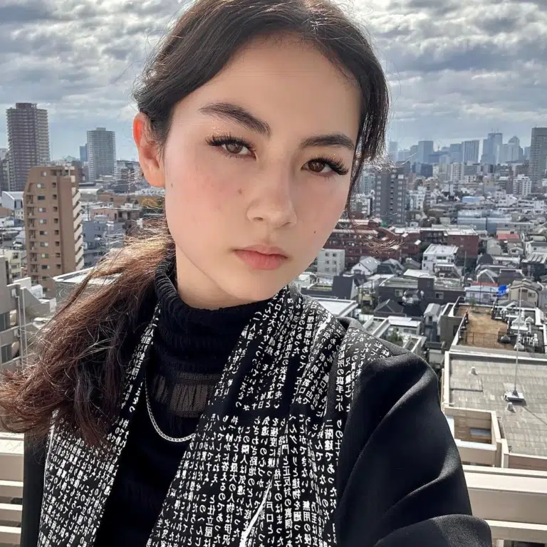 Kyedae's selfie overlooking a city