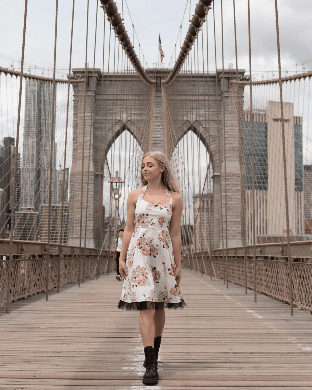 Melina posing on a beautiful bridge