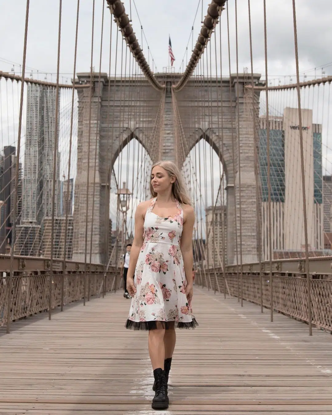 Melina posing on a beautiful bridge